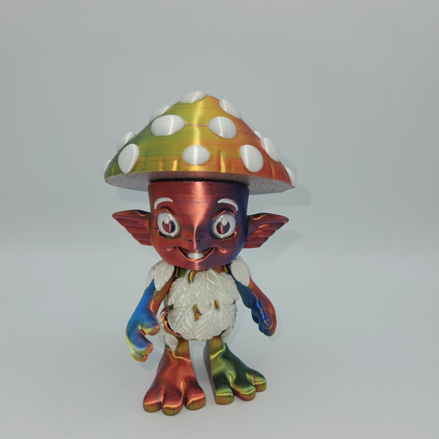 Mushroom Sprite Figurine — Silk Rainbow Description