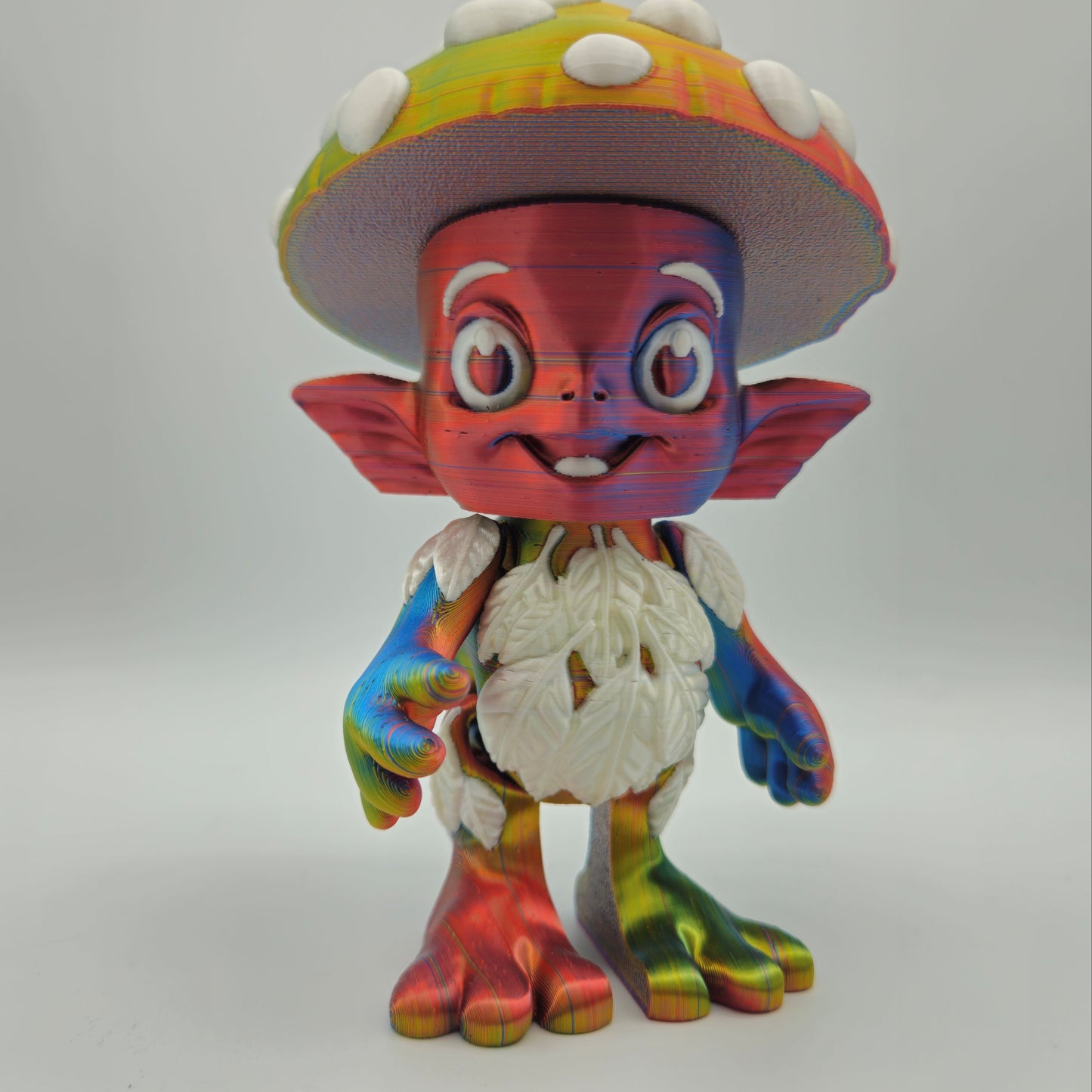 Mushroom Sprite Figurine — Silk Rainbow Description