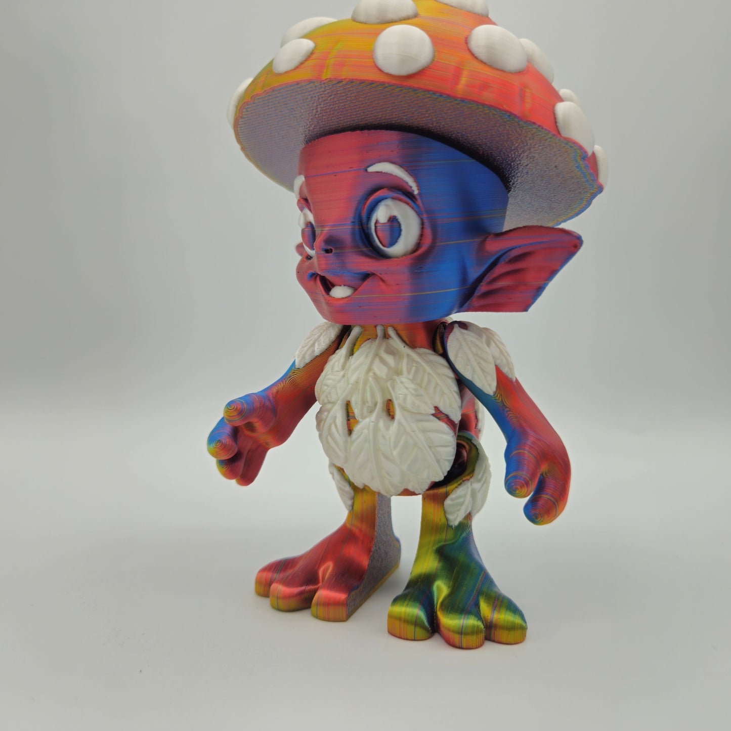 Mushroom Sprite Figurine — Silk Rainbow Description