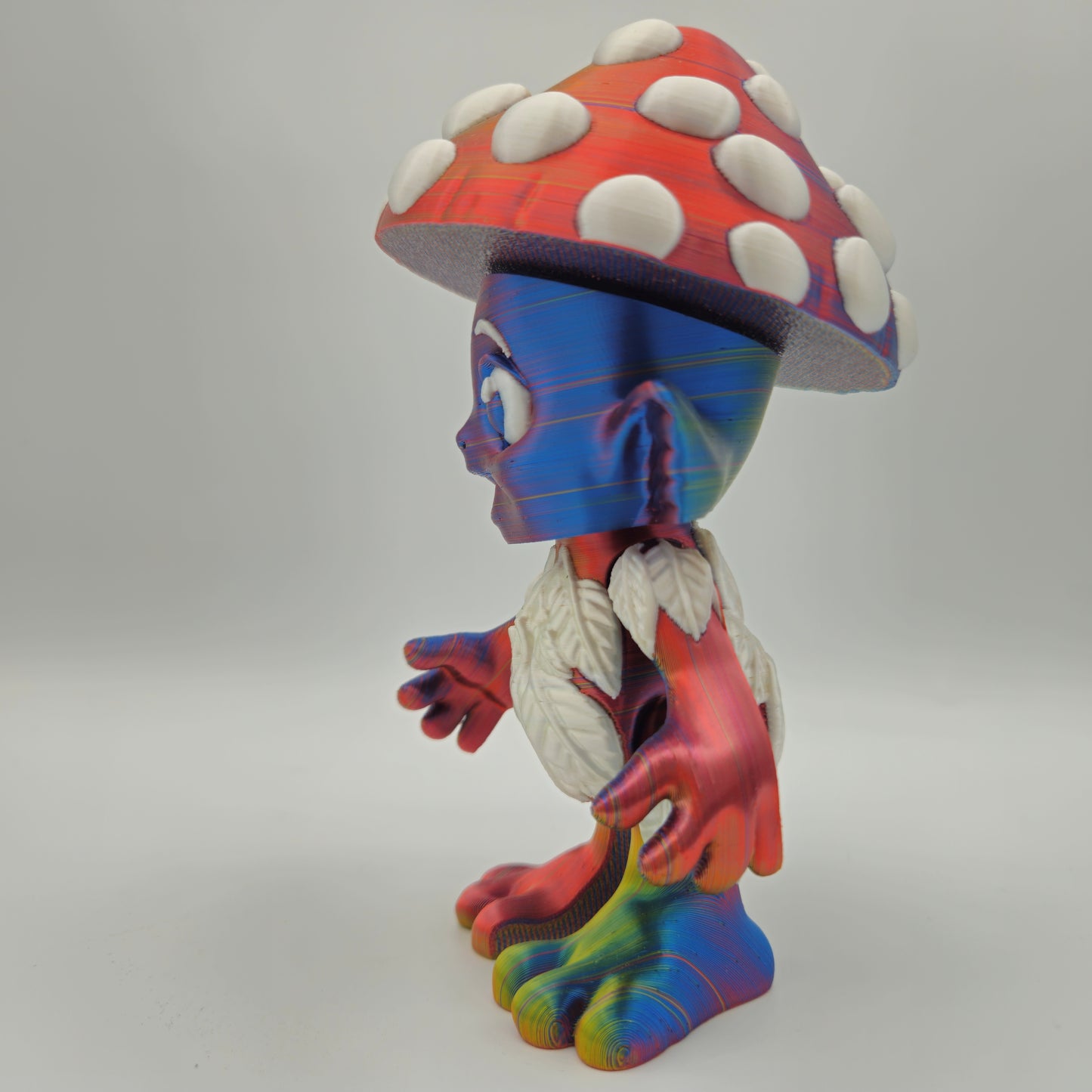 Mushroom Sprite Figurine — Silk Rainbow Description