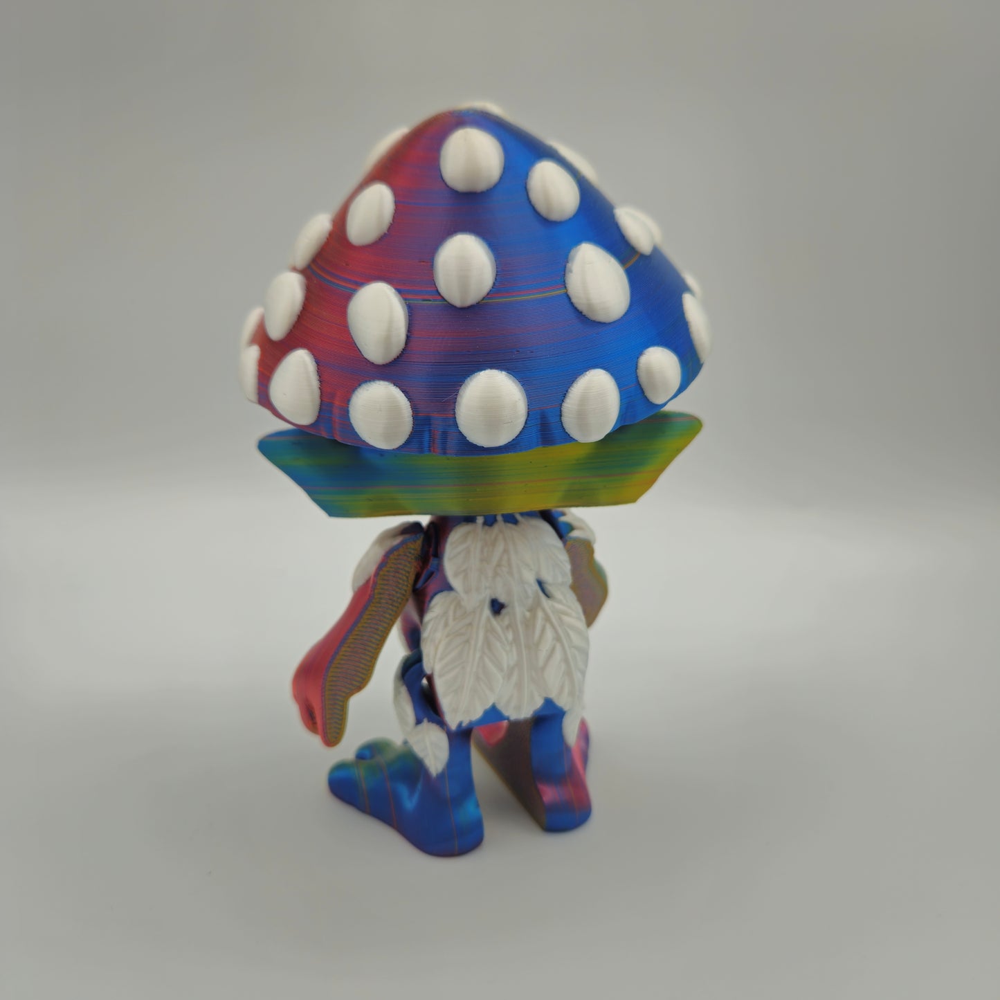 Mushroom Sprite Figurine — Silk Rainbow Description