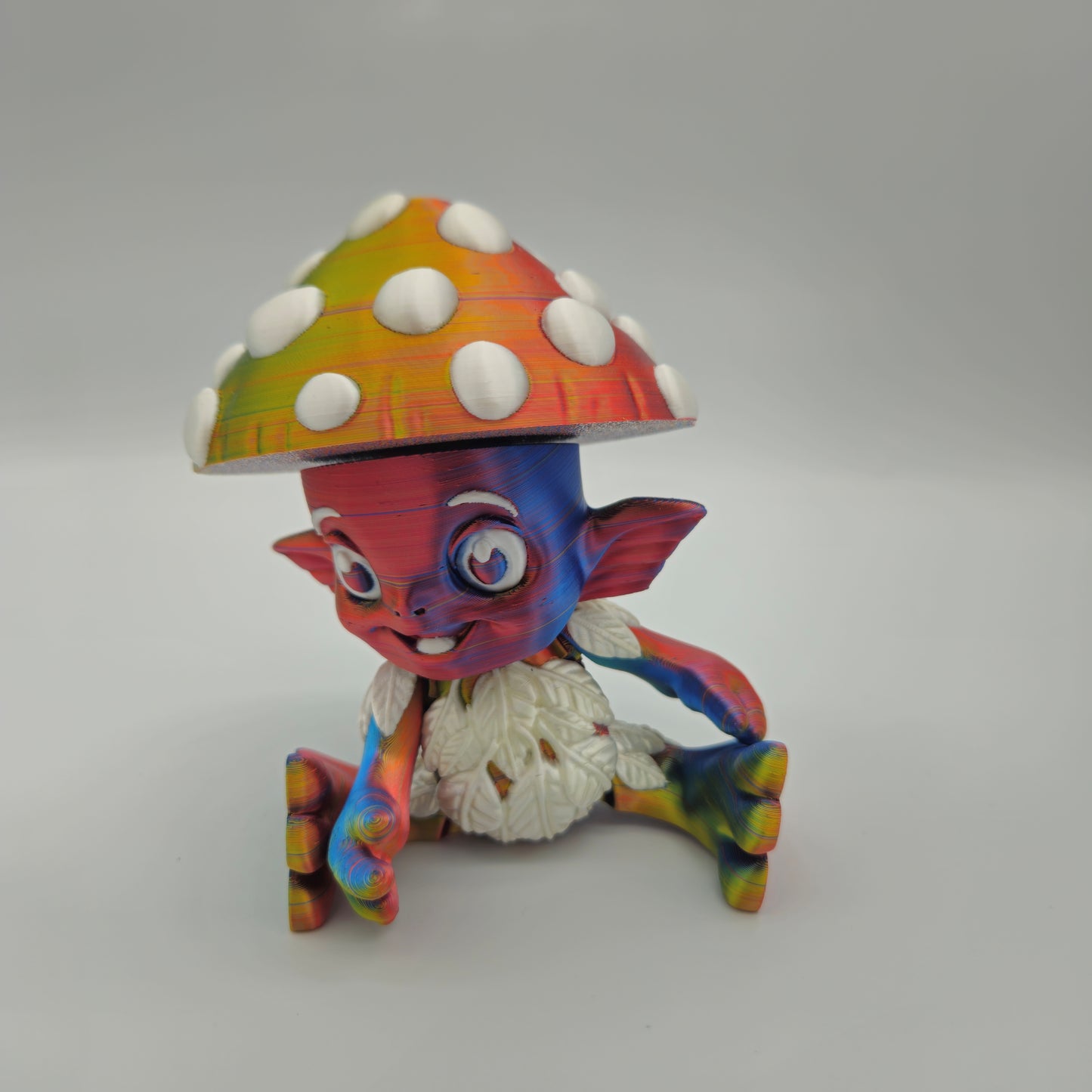 Mushroom Sprite Figurine — Silk Rainbow Description