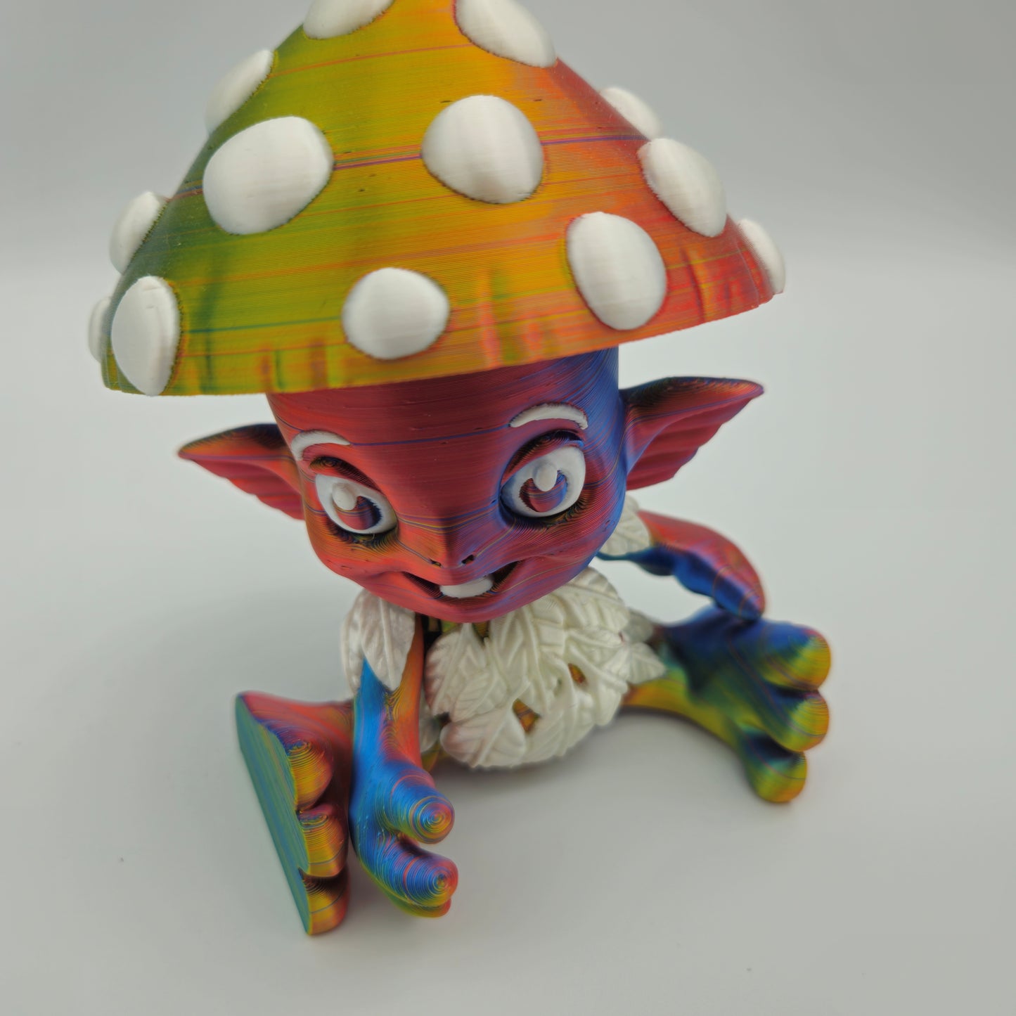 Mushroom Sprite Figurine — Silk Rainbow Description