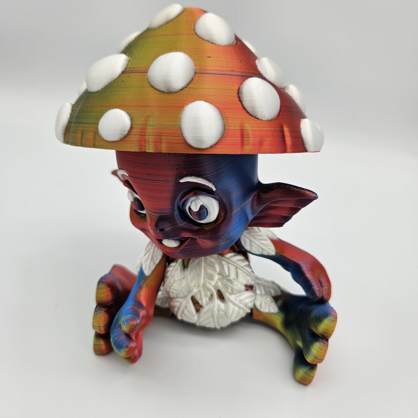 Mushroom Sprite Figurine — Silk Rainbow Description