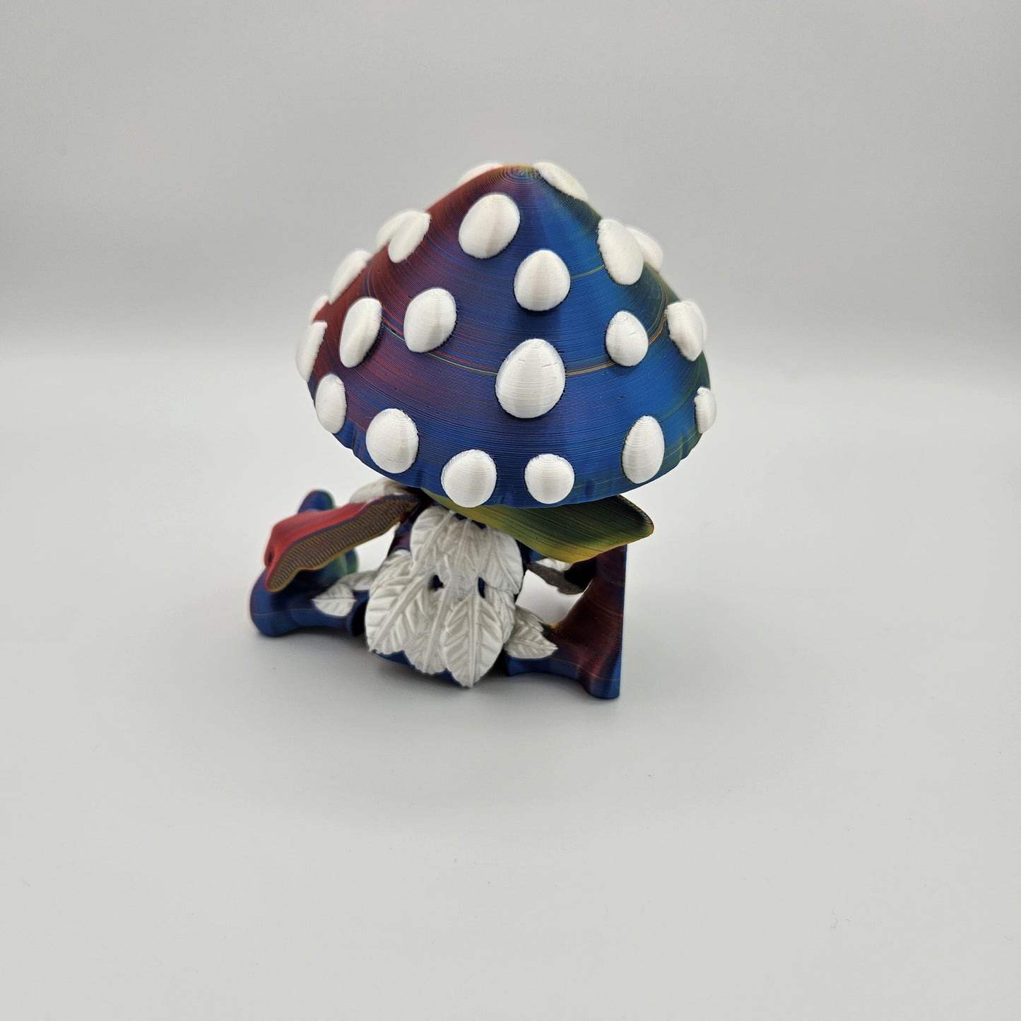 Mushroom Sprite Figurine — Silk Rainbow Description