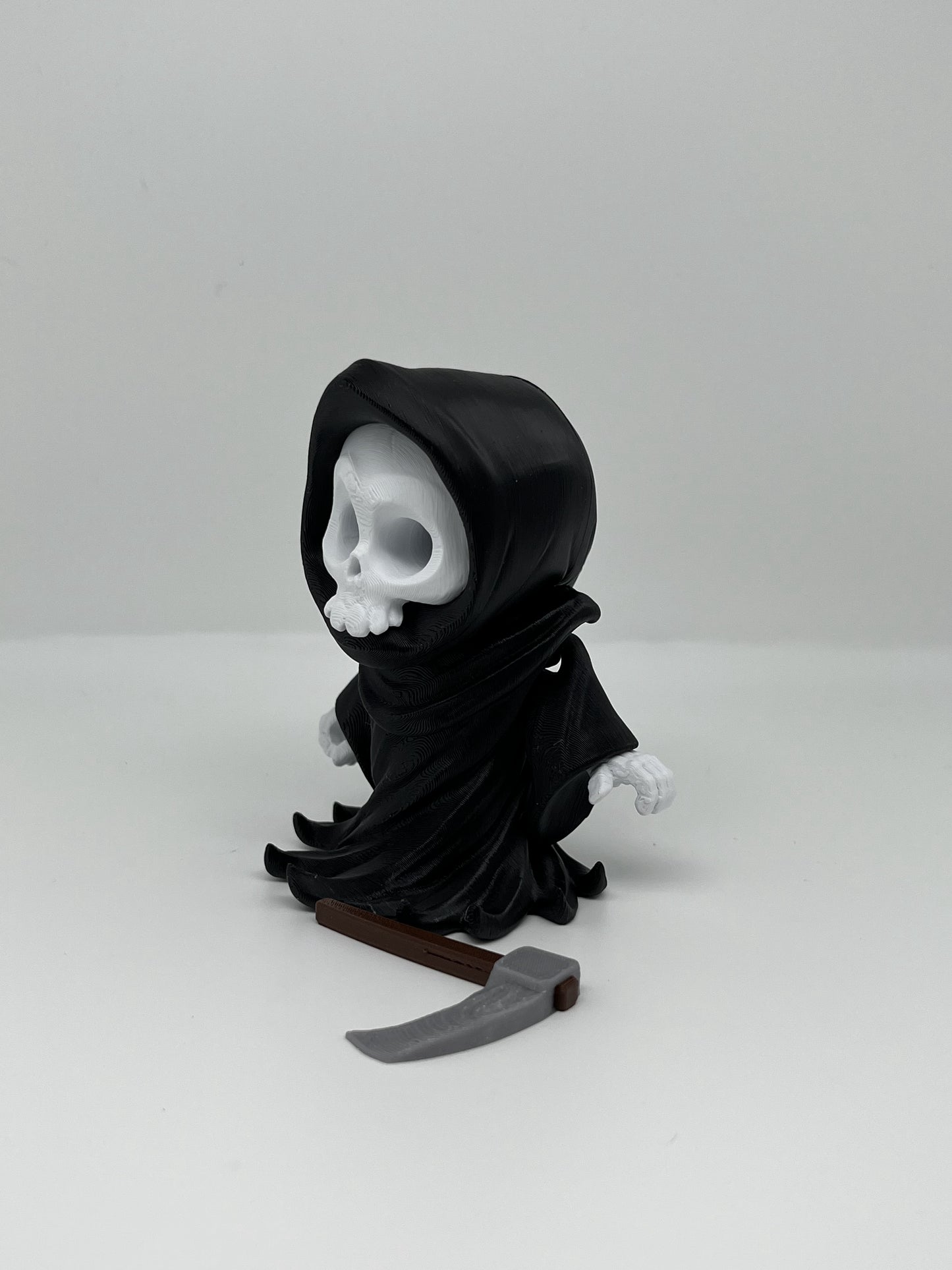 Grisly Reaper Mini Statue — Hooded Skull with Scythe
