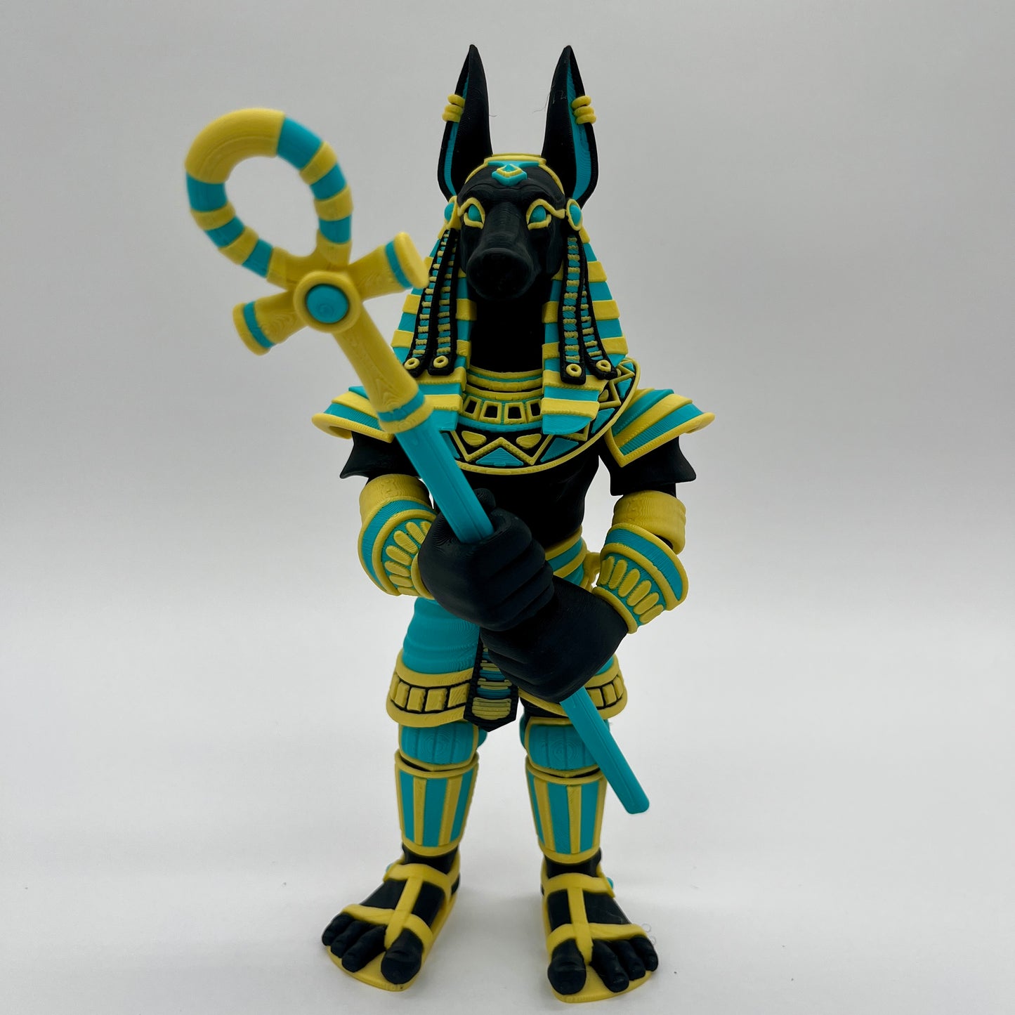 Anubis – Guardian Warrior Figurine (Black, Yellow & Teal)