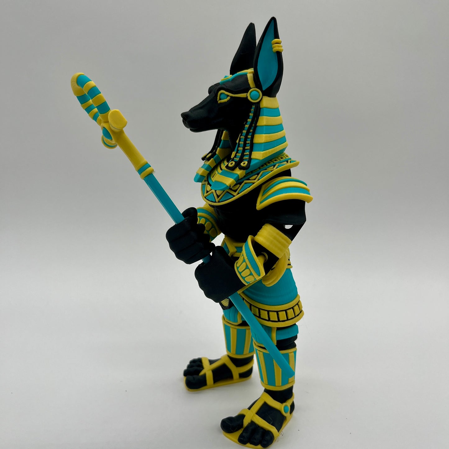 Anubis – Guardian Warrior Figurine (Black, Yellow & Teal)