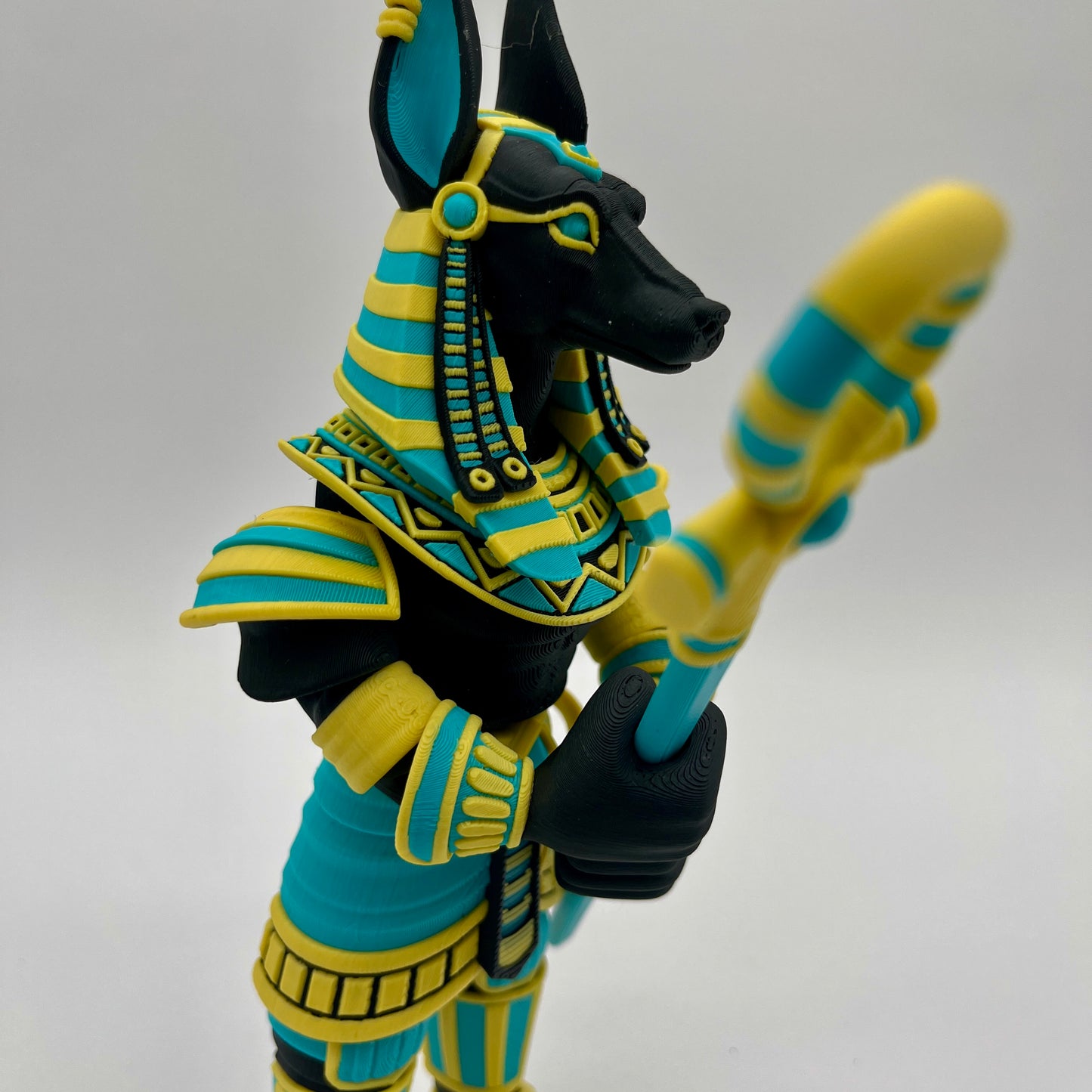 Anubis – Guardian Warrior Figurine (Black, Yellow & Teal)