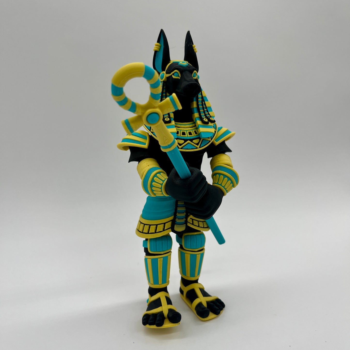 Anubis – Guardian Warrior Figurine (Black, Yellow & Teal)