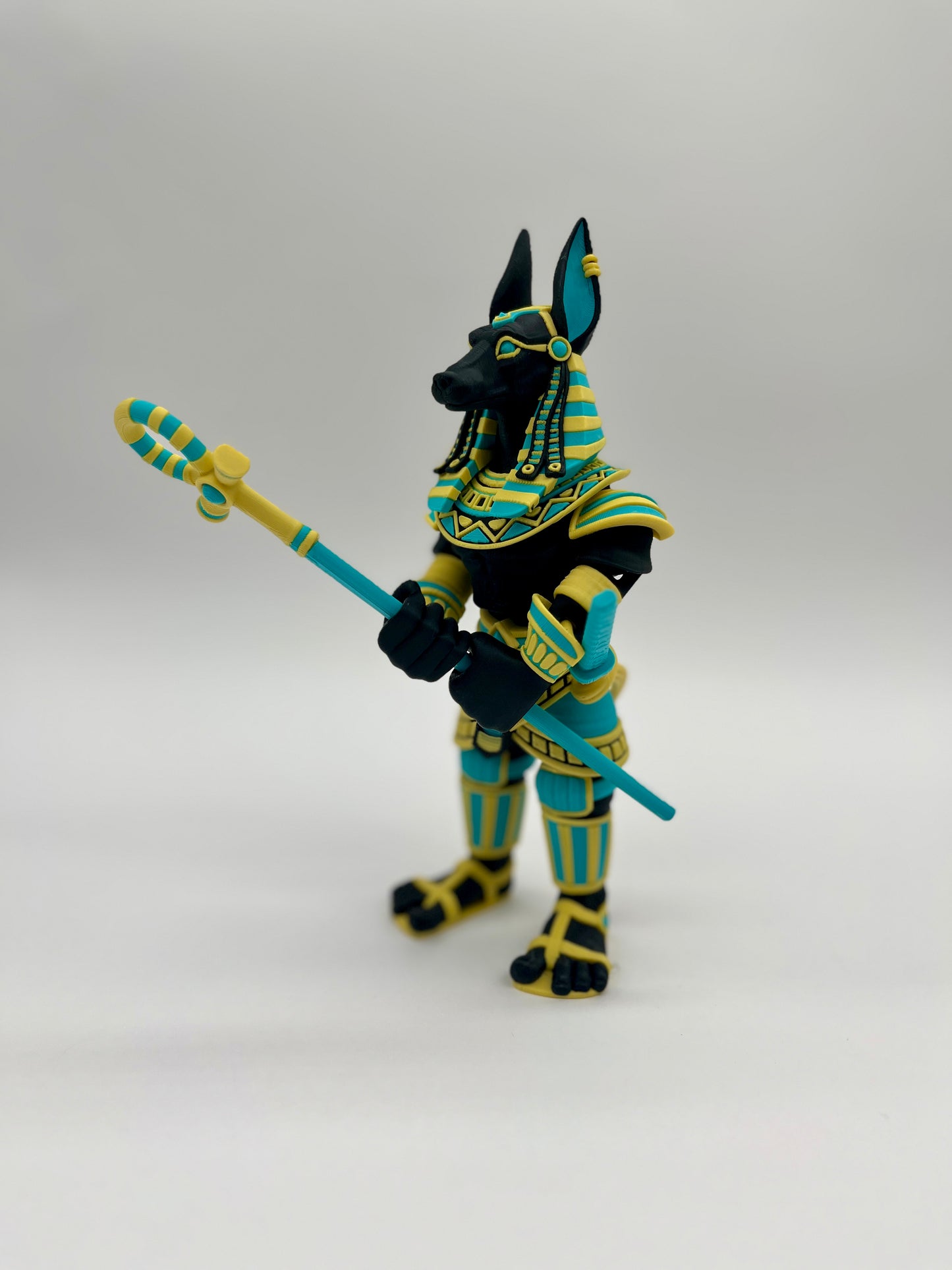 Anubis – Guardian Warrior Figurine (Black, Yellow & Teal)