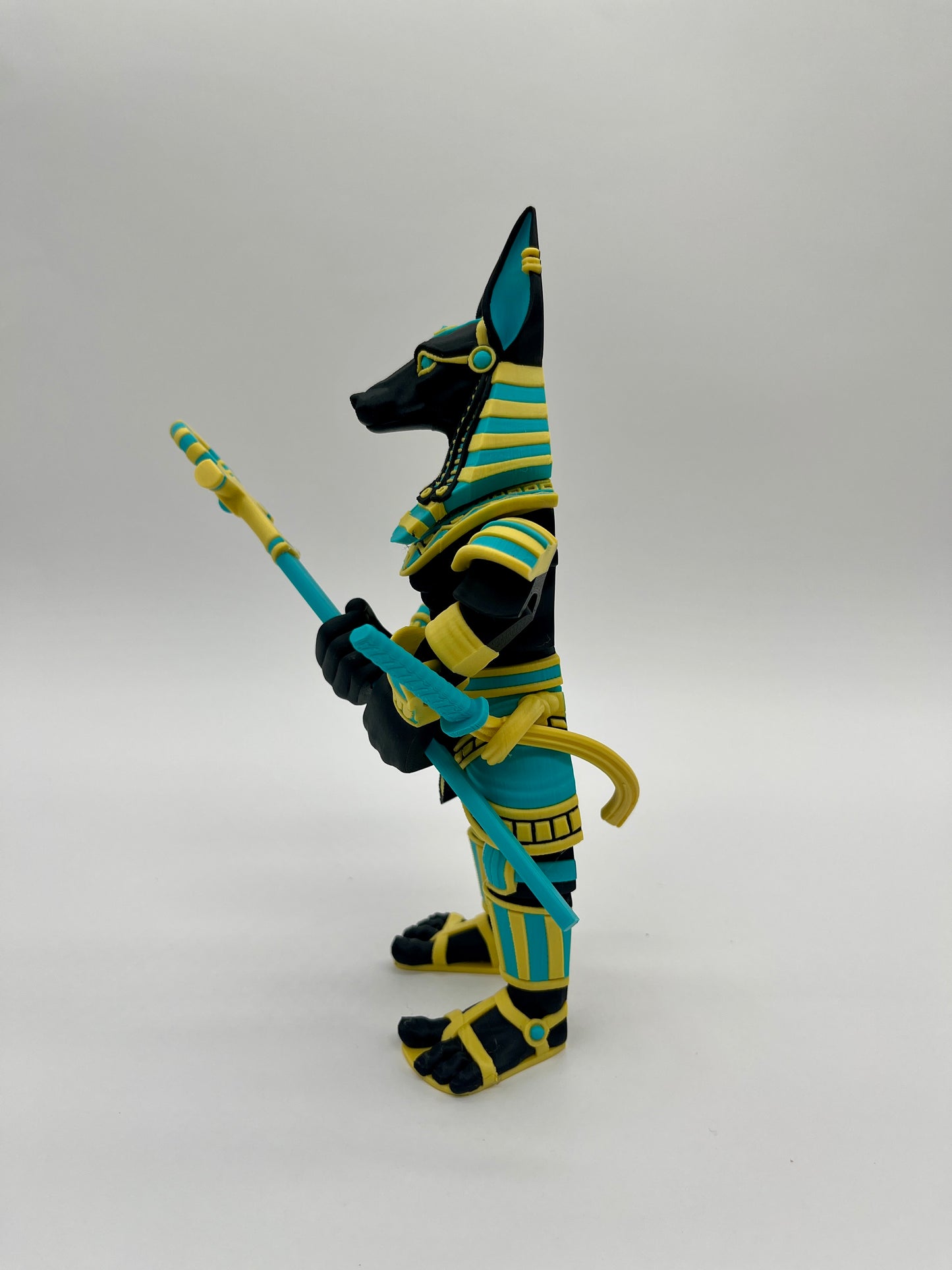 Anubis – Guardian Warrior Figurine (Black, Yellow & Teal)