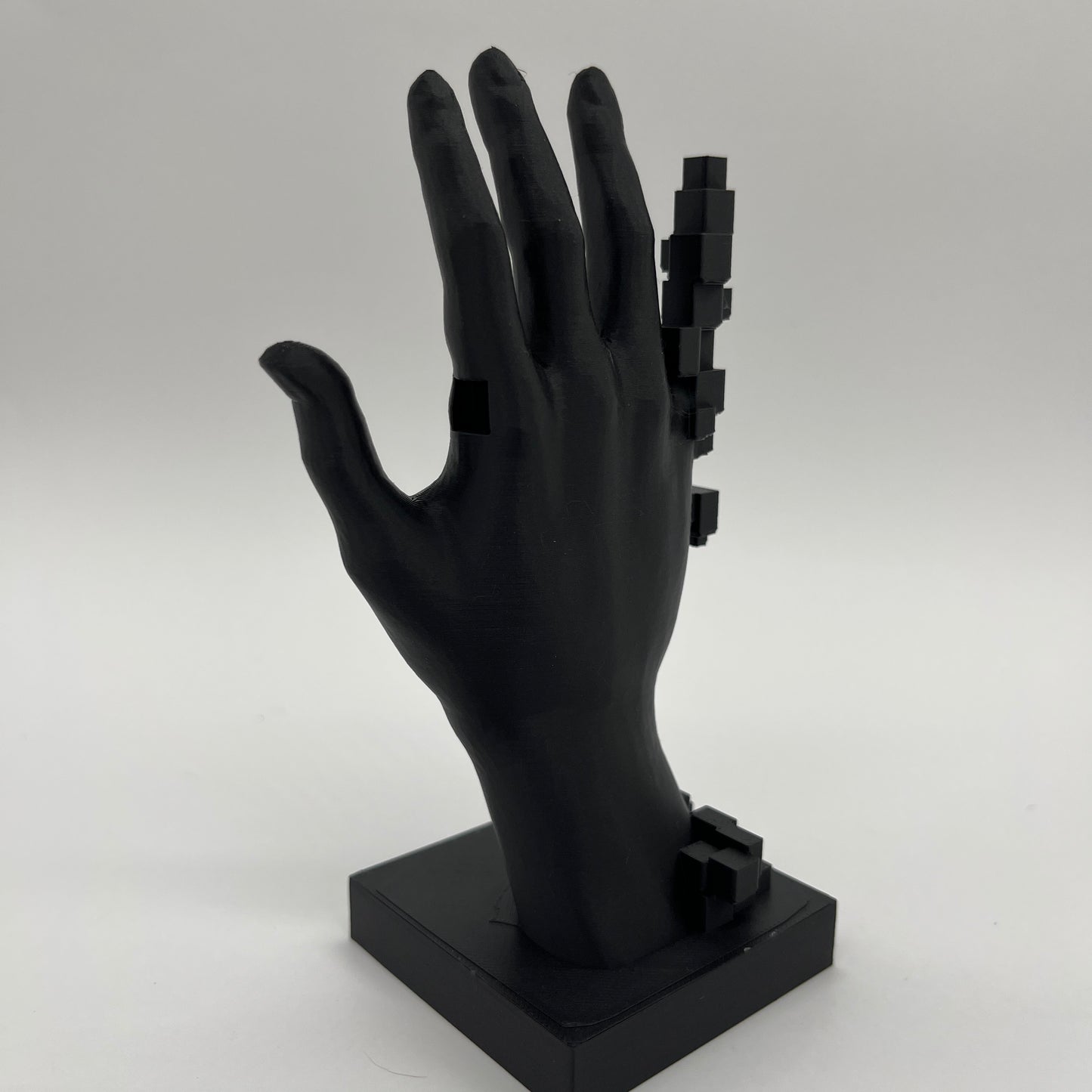Pixelated Hand Statue — Matte Charcoal Black