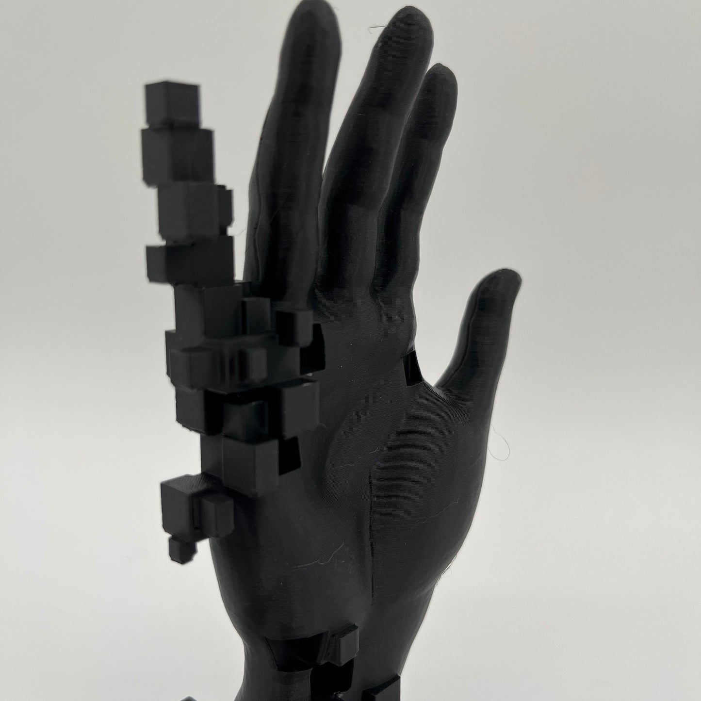 Pixelated Hand Statue — Matte Charcoal Black