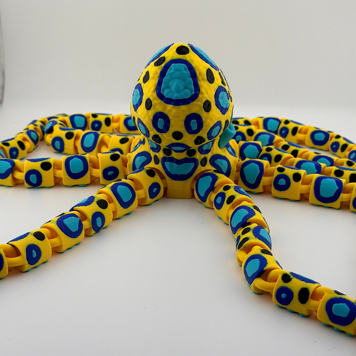 Neon Tide Articulated Octopus Decor – Colorful Poseable Oceanic Accent by 3BC Creations