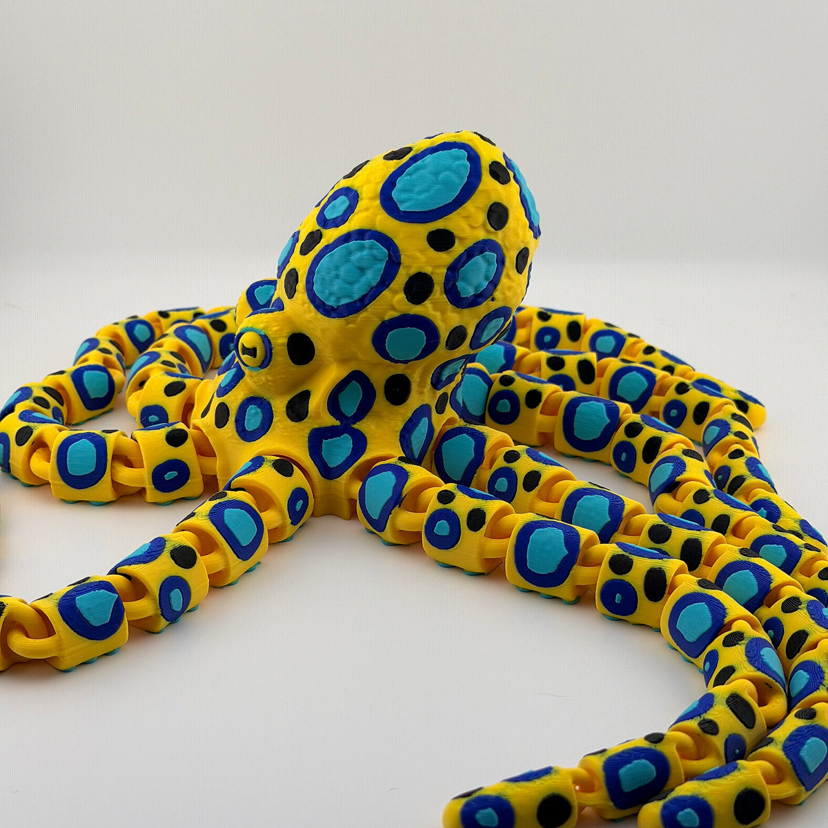 Neon Tide Articulated Octopus Decor – Colorful Poseable Oceanic Accent by 3BC Creations