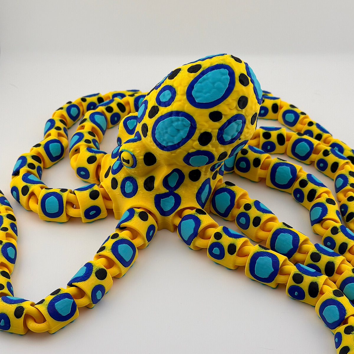 Neon Tide Articulated Octopus Decor – Colorful Poseable Oceanic Accent by 3BC Creations