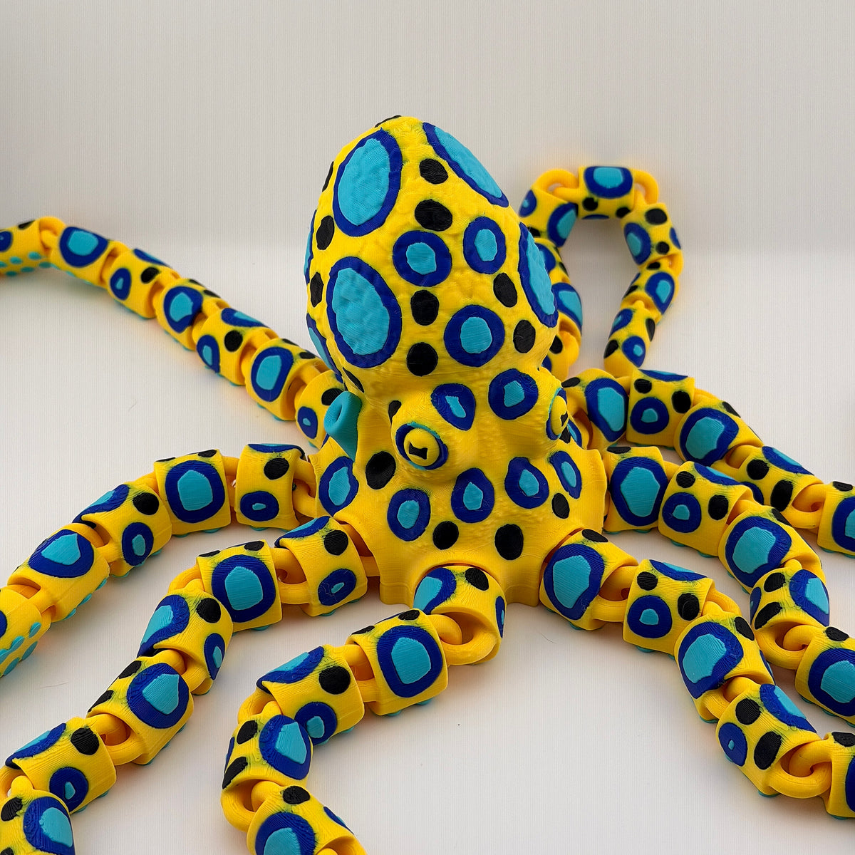Neon Tide Articulated Octopus Decor – Colorful Poseable Oceanic Accent by 3BC Creations