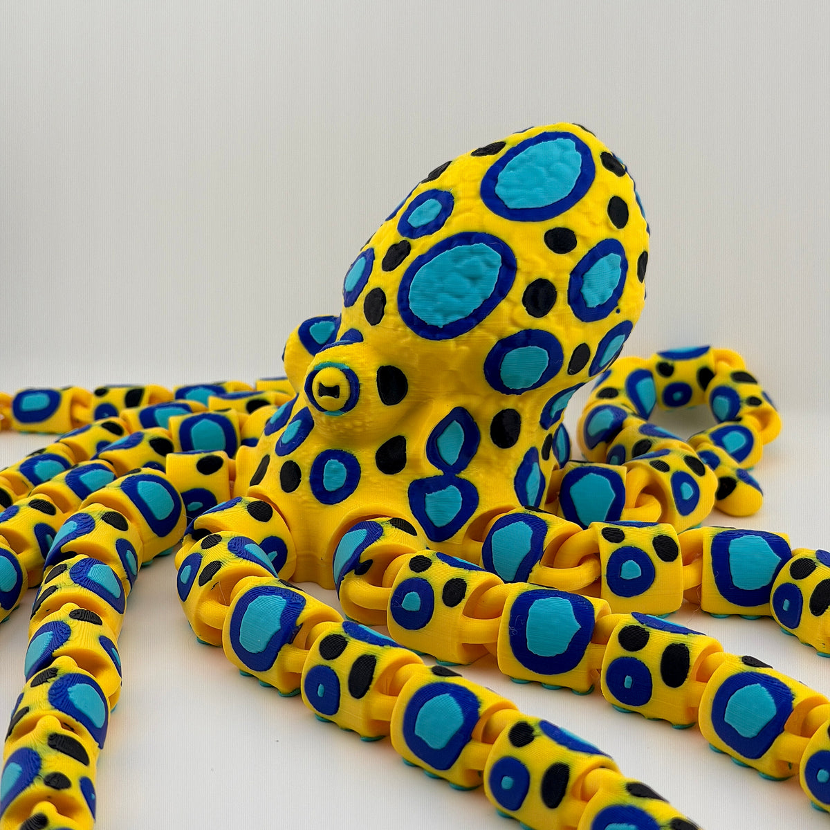 Neon Tide Articulated Octopus Decor – Colorful Poseable Oceanic Accent by 3BC Creations