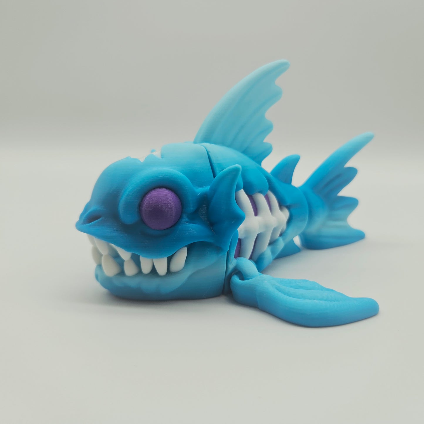 Abyssal Bonefish Figurine – Blue/Purple