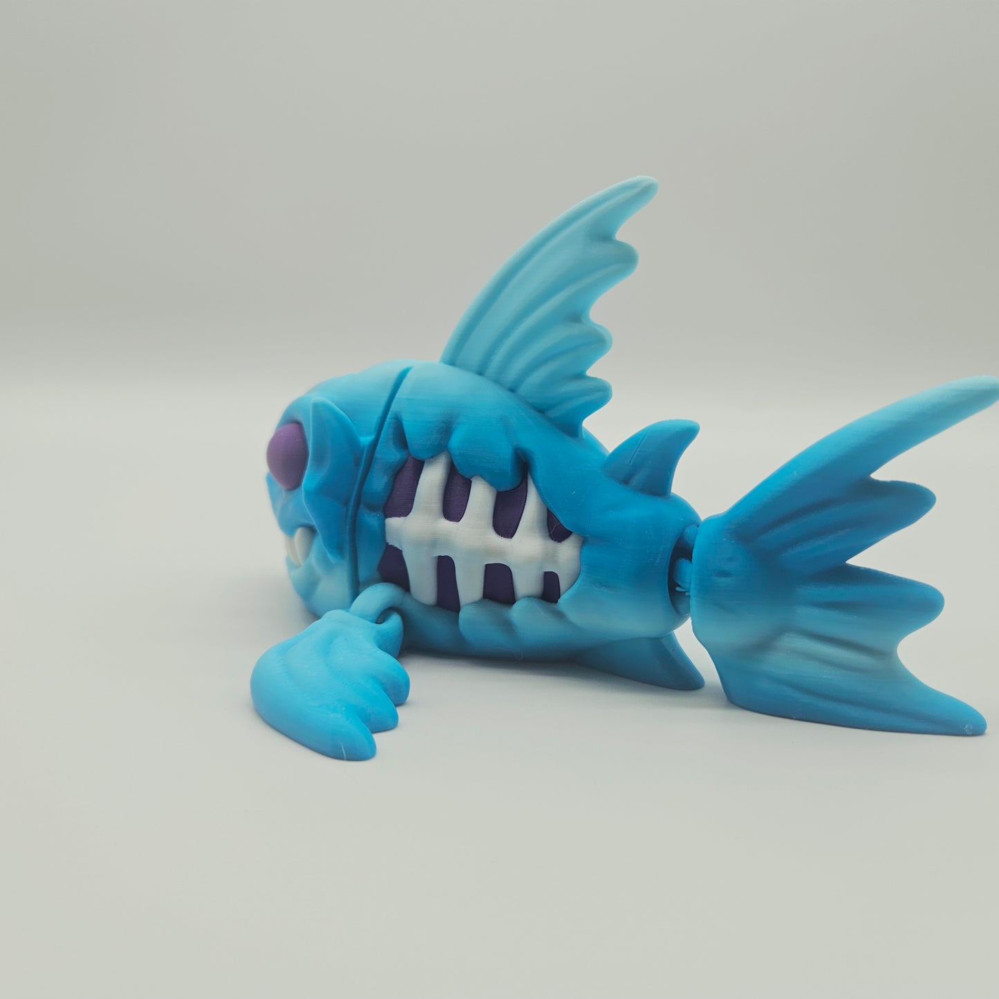 Abyssal Bonefish Figurine – Blue/Purple
