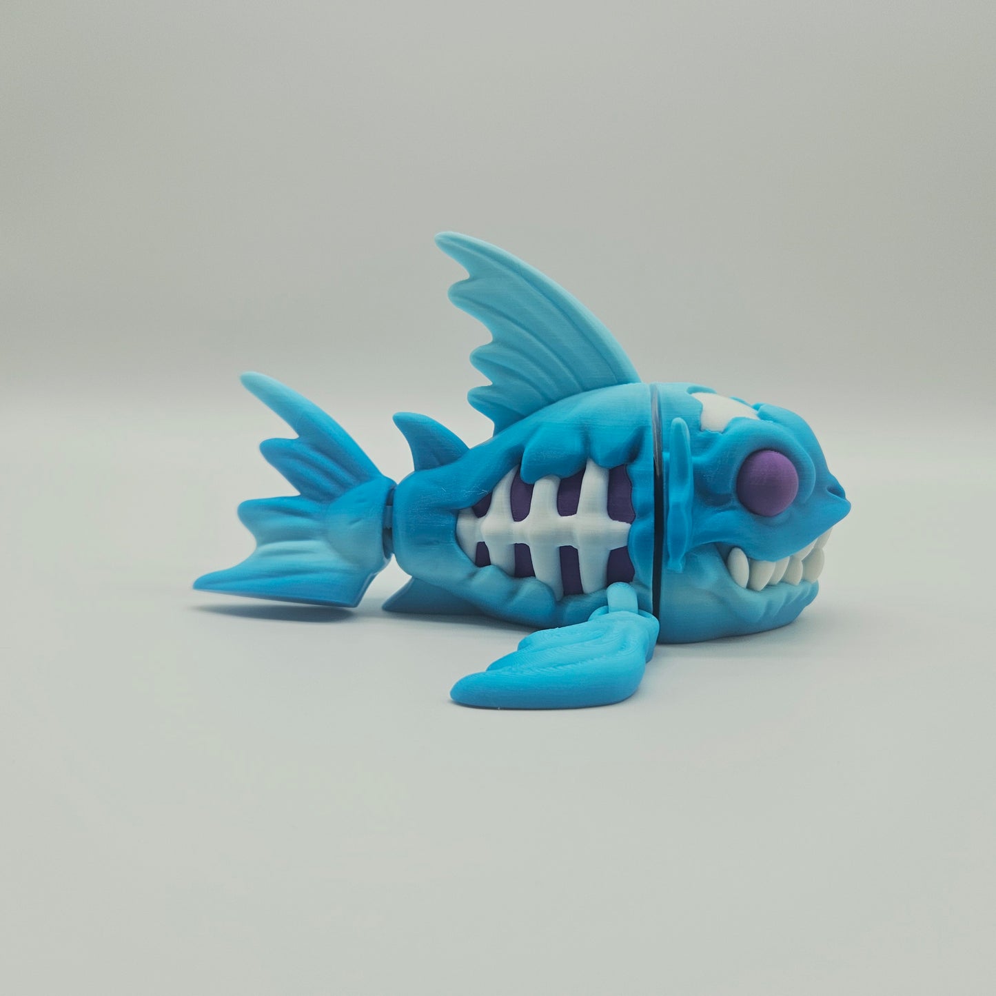 Abyssal Bonefish Figurine – Blue/Purple