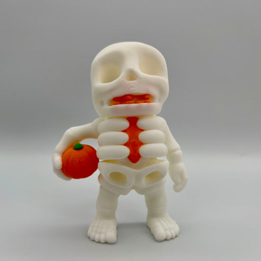 Skeleton Holding Pumpkin — Matte Ivory White 4"