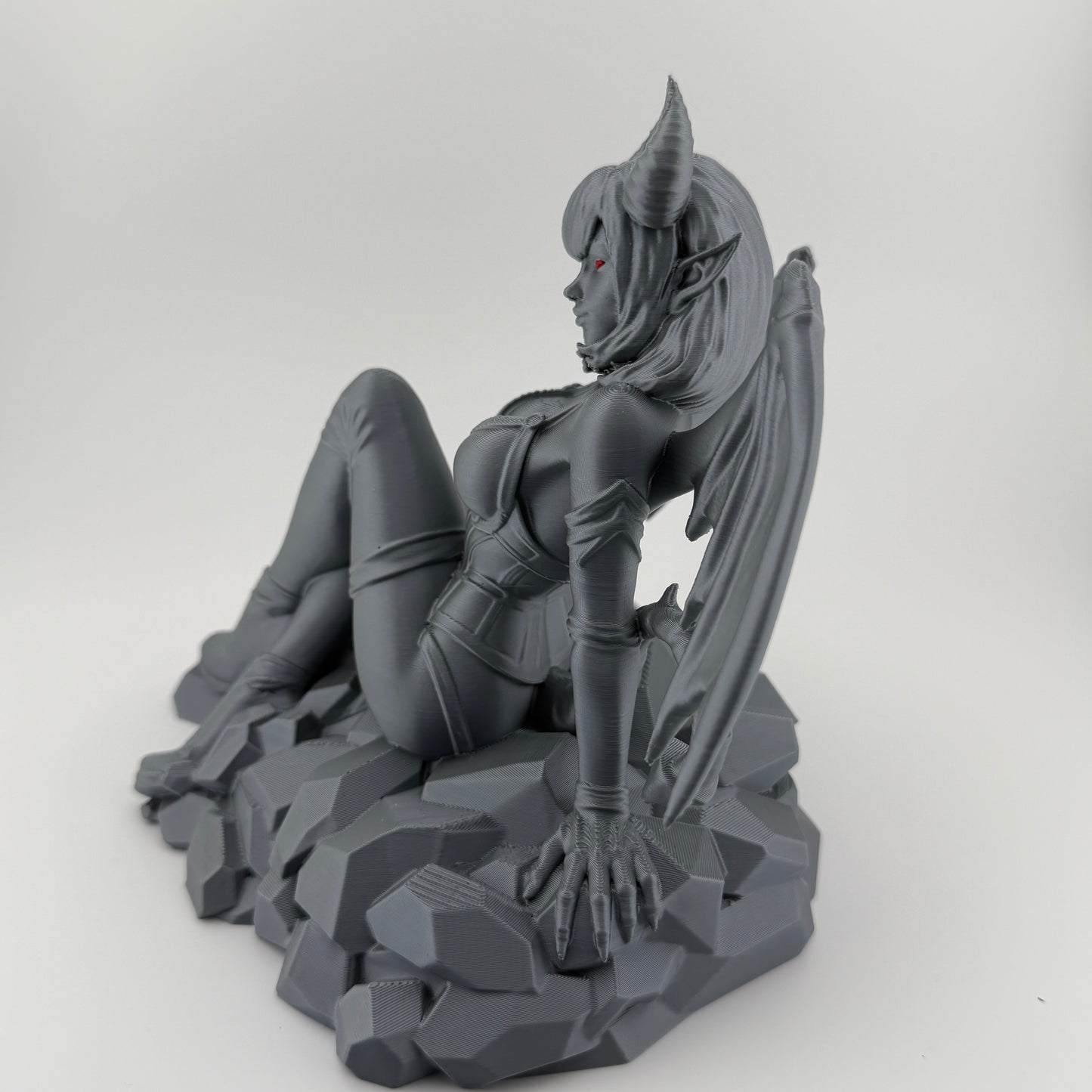 Silver Winged Demoness Statue with Red Eyes – Gothic Fantasy Décor